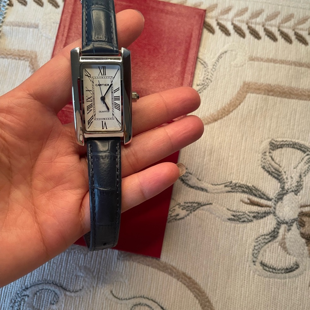 Cartier Silver Dial Watch with Dark Blue Strap
